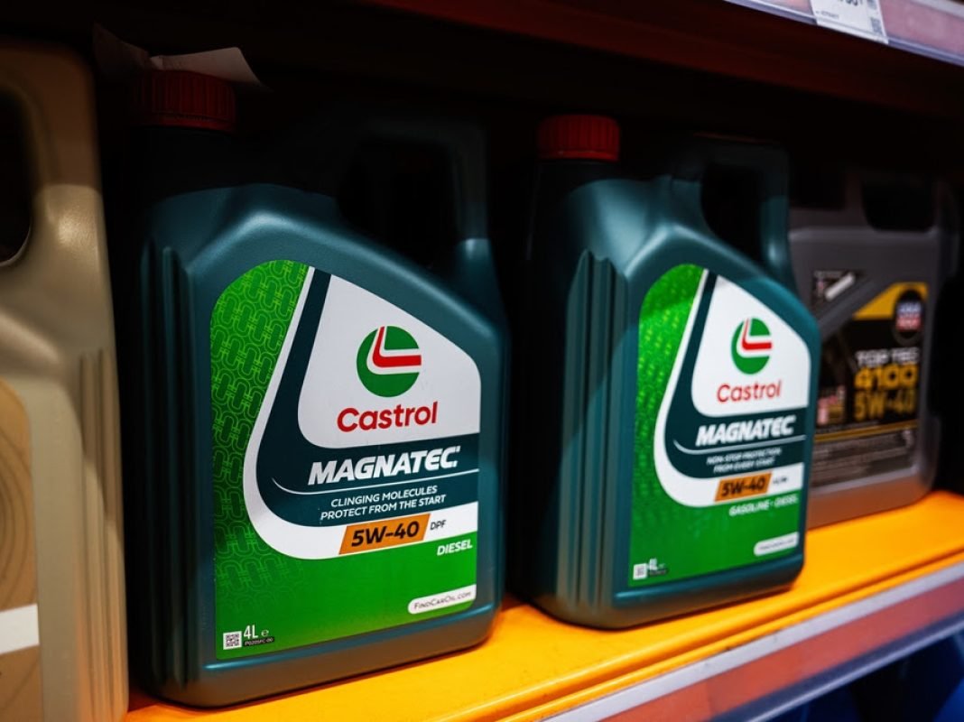 Kyiv, Ukraine - April 14, 2025: Motor oil bottles of Castrol Magnatec brands arranged on shelves inside a retail store.